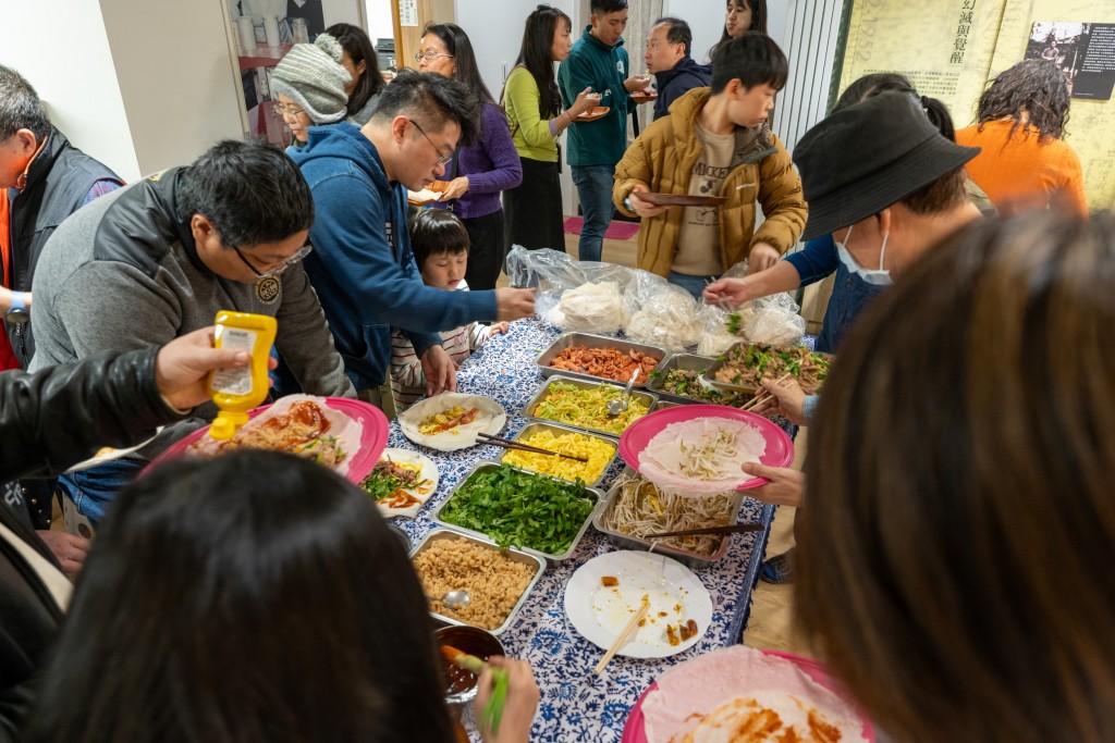 Guests help themselves to runbing, a kind of Taiwanese spring roll.